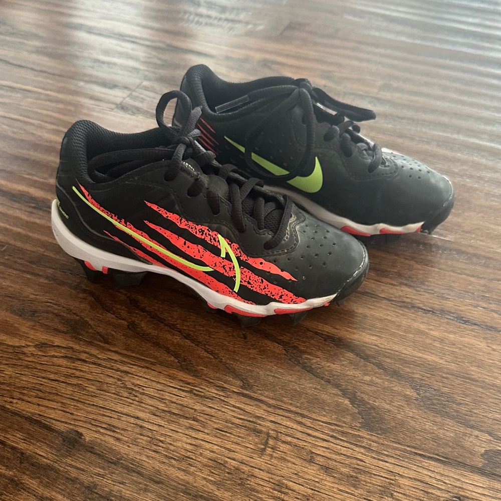 Nike Black, orange, neon yellow baseball cleat 11C